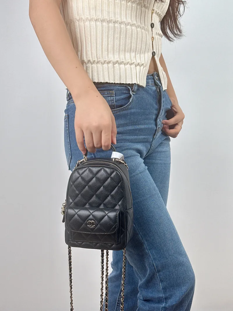Chanel Crossbody Bag Mini Backpack Crossbody Bag Black Grained Calfskinmini13 × 9 × 18 cm — on-model view 1 of 3