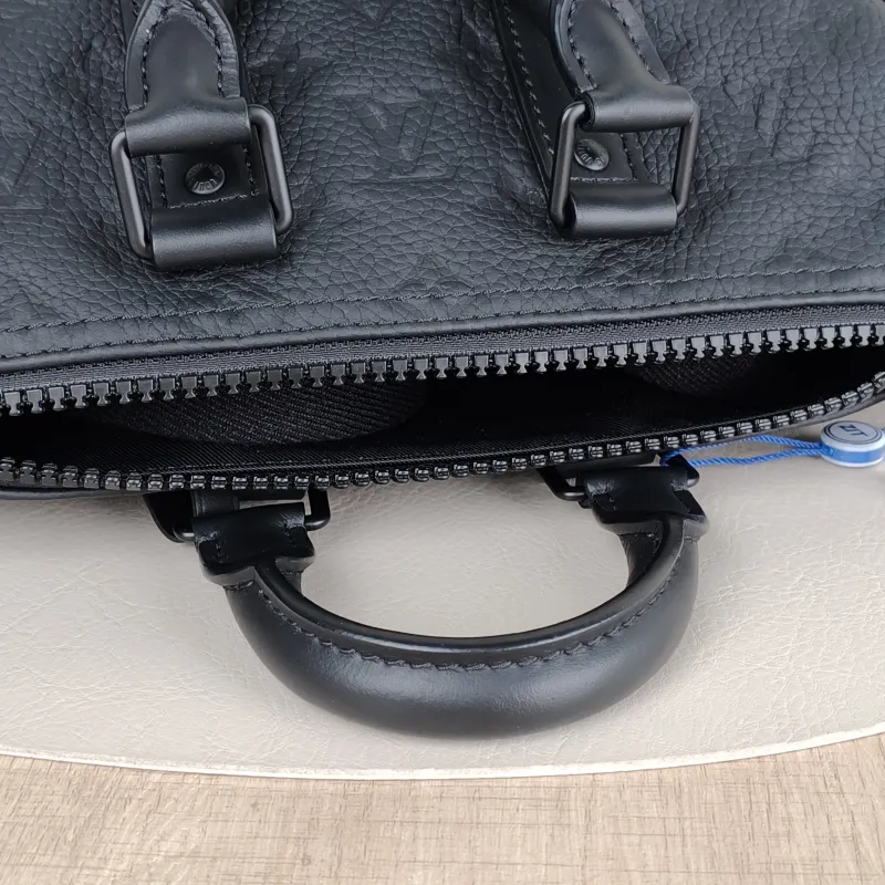 Louis Vuitton Crossbody Bag Keepall 25 Taurillon Embossed Calfskin Monogram Medium25 × 11 × 15 cm — detail view 11 of 12
