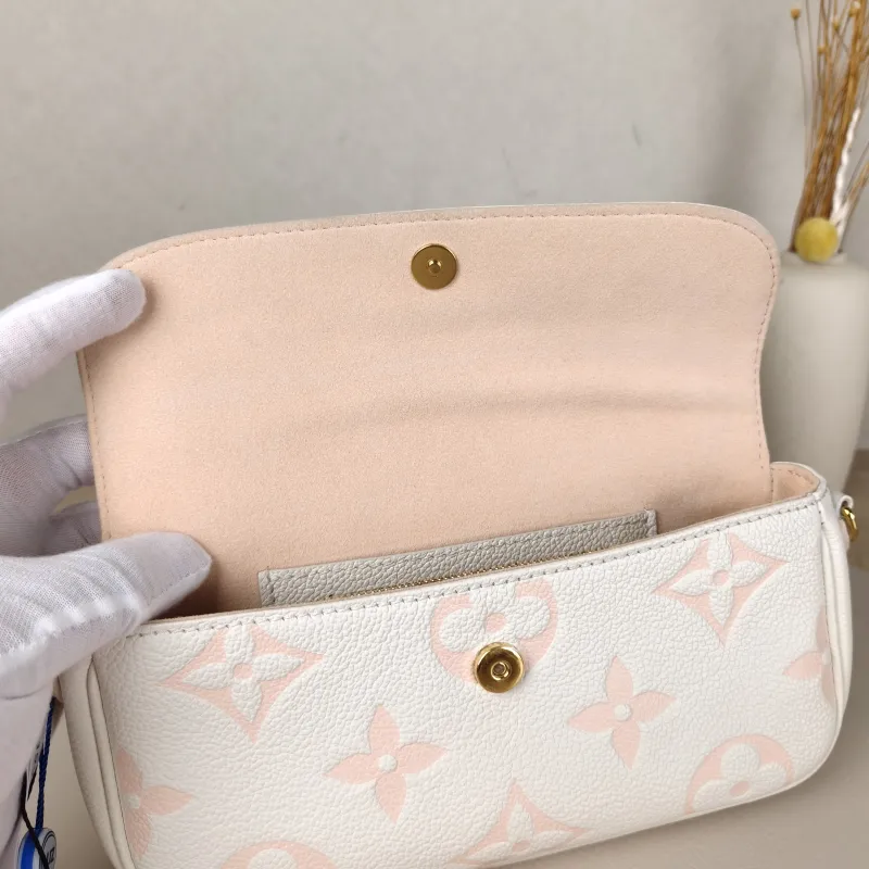 Louis Vuitton Crossbody Bag IVY White · Pink Empreinte Embossed Calfskin Monogram Small23.5 × 4.3 × 12 cm — detail view 1 of 13