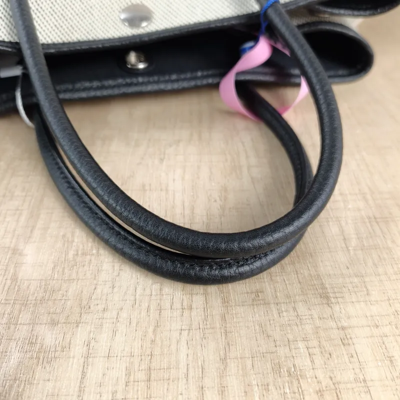 Hermès Top Handle Bag Garden Party 30 30 Beige · Black Canvas · Negonda Calfskin Medium 30 × 13 × 21 cm B — detail view 6 of 10