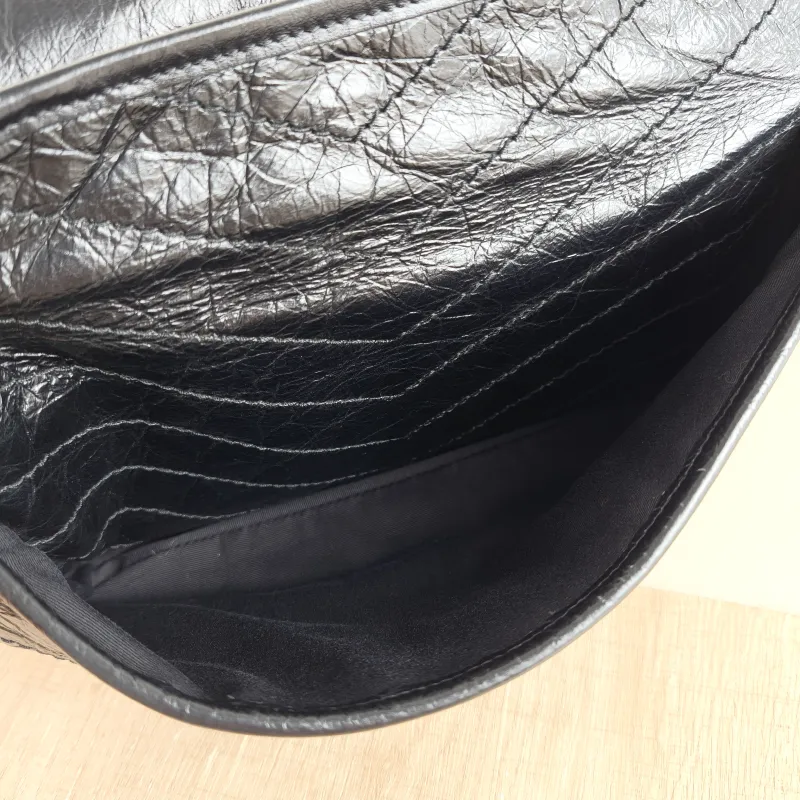 SAINT LAURENT Crossbody Bag Niki Black Calfskin Large 32 × 9 × 23 cm — detail view 7 of 13