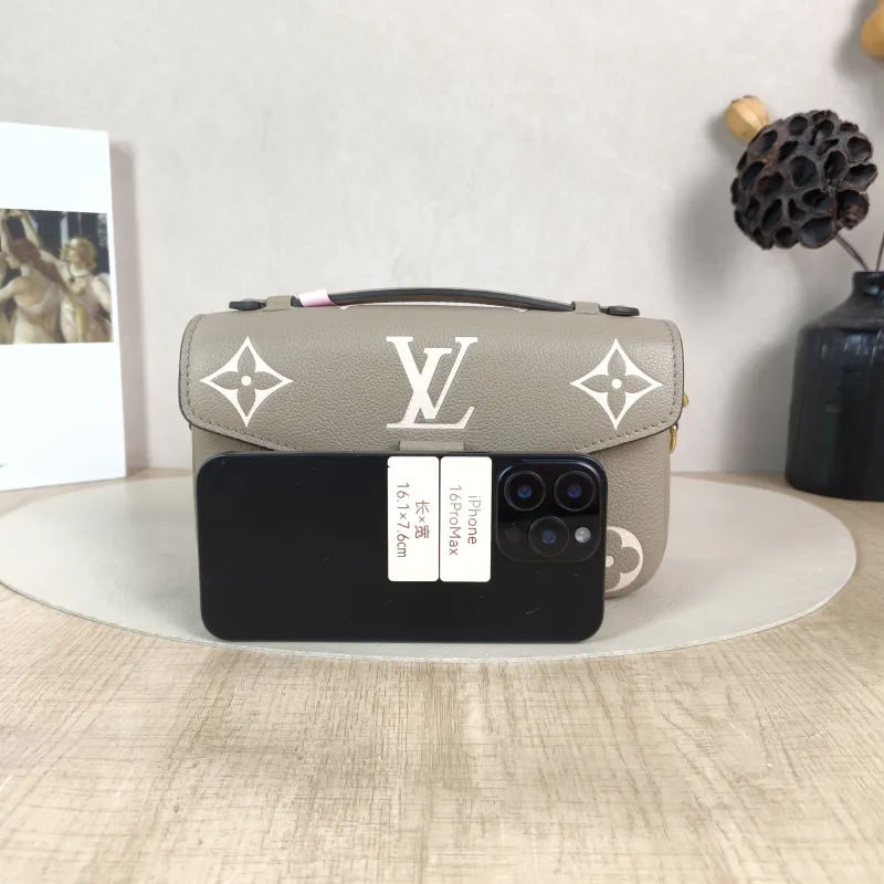 Louis Vuitton Crossbody Bag Pochette Métis East West Monogram Empreinte Embossed Calfskin Small 21.5 × 6 × 13.5 cm — cover view 2 of 5