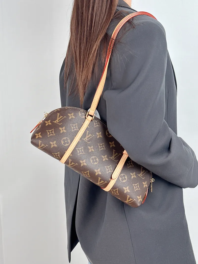 Louis Vuitton Shoulder Bag Squire East West Monogram PVC One Size 29 × 8 × 14 cm — on-model view 1 of 2