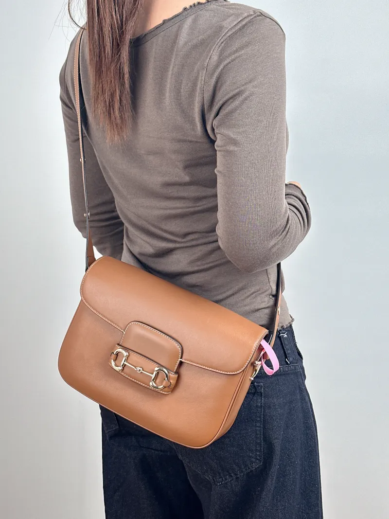 GUCCI Crossbody Bag Horsebit 1955 Horsebit Medium Caramel Calfskin Medium 25 × 8 × 18 cm — on-model view 2 of 2