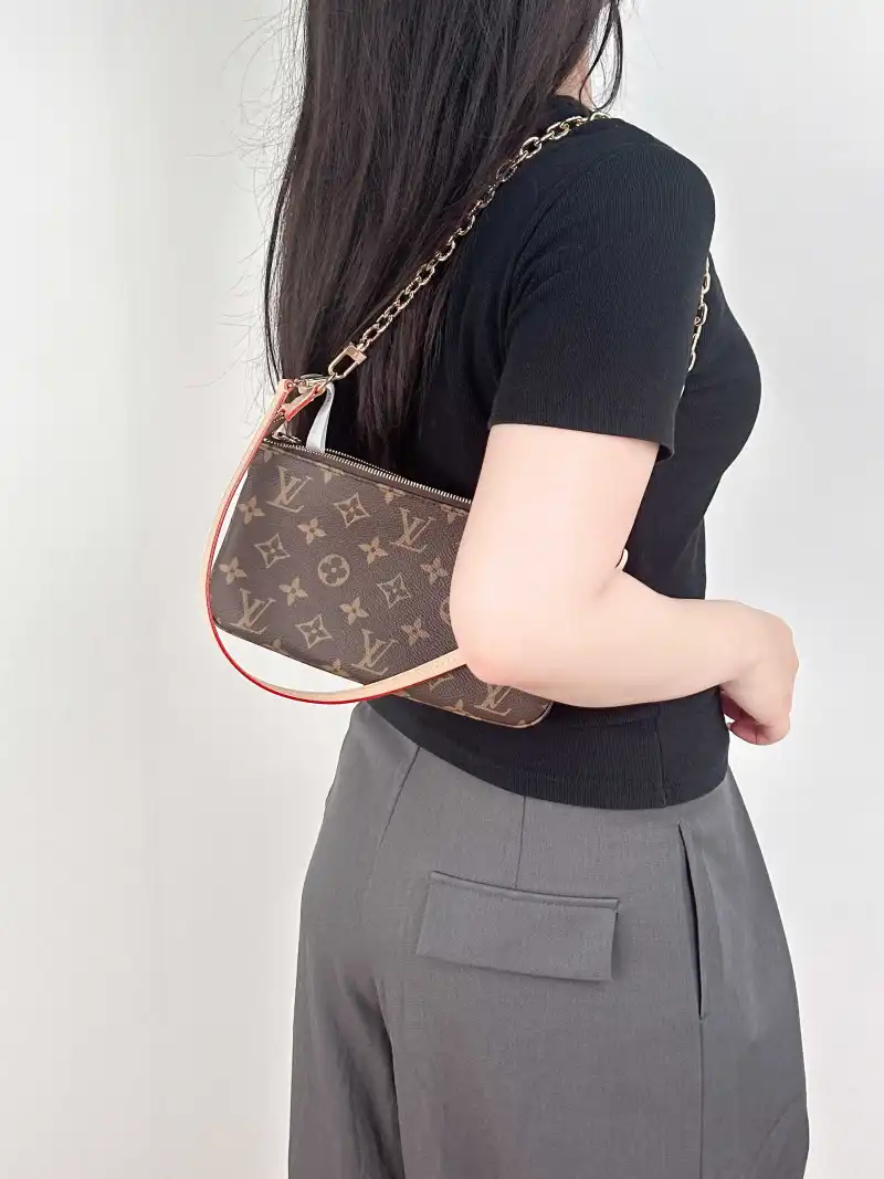 Louis Vuitton Shoulder Bag Pochette Accessoires Two Straps Monogram PVC Large 23.5 × 4 × 13.5 cm — on-model view 2 of 3