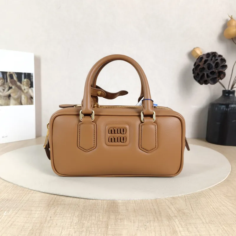 Miumiu Top Handle Bag Arcadie Collection Bowling Bag CC alfskin Medium 22 × 7.5 × 10.5 cm
