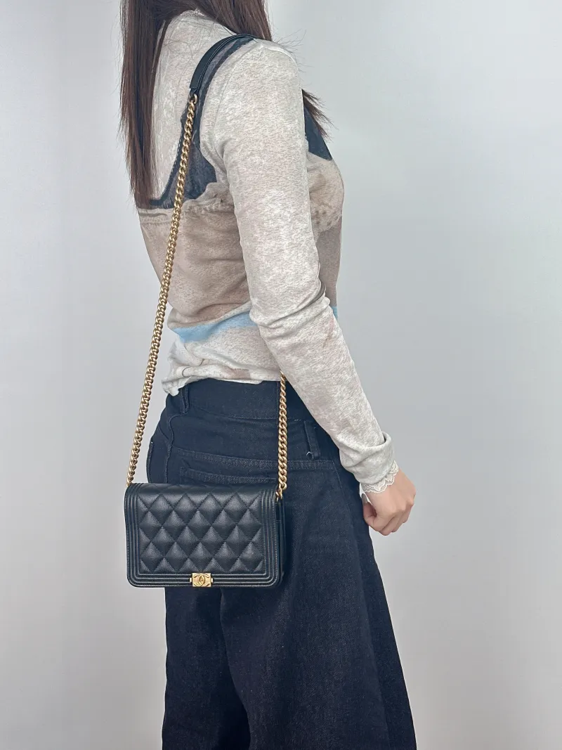 Chanel Crossbody Bag Le Boy​ WOC Black Grained Calfskinmini19.2 × 3.5 × 12.3 cm — on-model view 1 of 2
