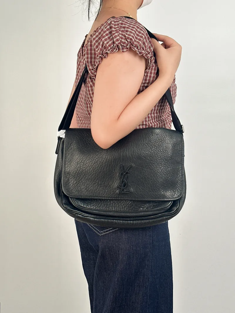 SAINT LAURENT Crossbody Bag Niki Black Lambskin 32 × 9 × 23 cm — on-model view 2 of 2