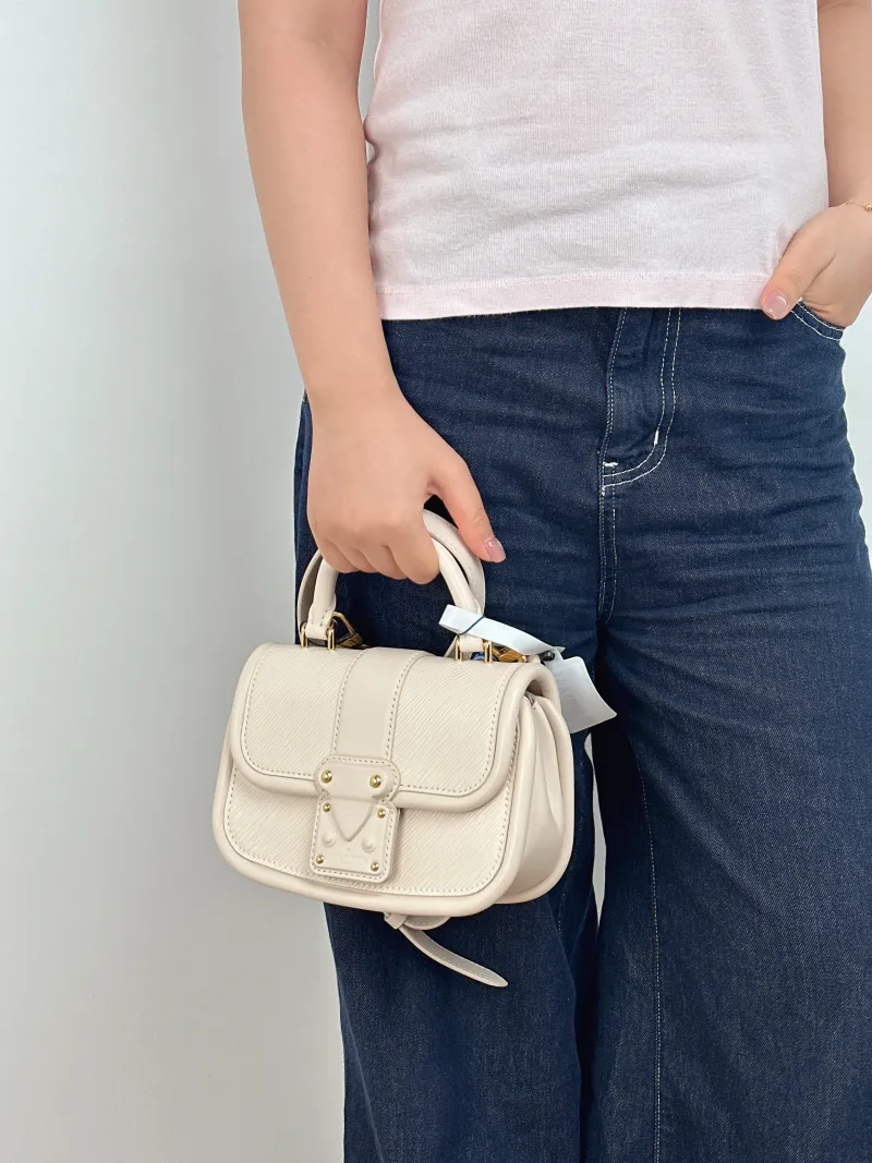 Louis Vuitton Crossbody Bag Hide and Seek Messenger Bag White Epi Embossed Calfskin 21 × 8 × 15 cm — on-model view 2 of 2