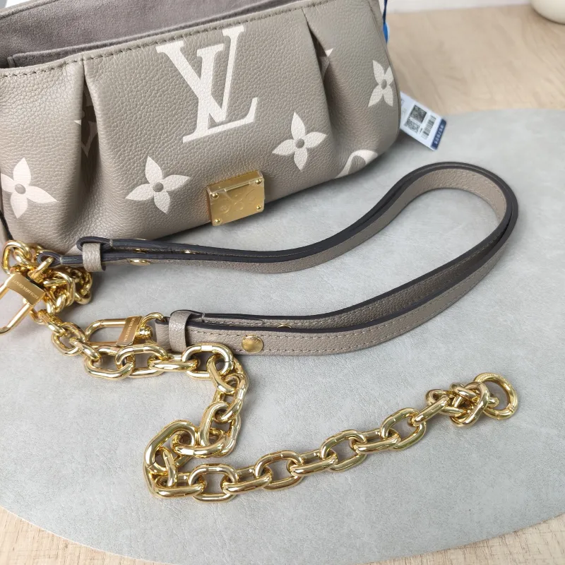 Louis Vuitton Crossbody Bag Favorite Empreinte Embossed Calfskin Medium24 × 9 × 14 cm — detail view 5 of 13