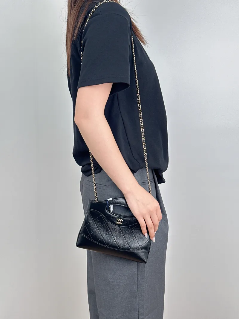 Chanel Shoulder Bag31Bag Black Waxed Leathernano20.5 × 3.5 × 17 cm — on-model view 2 of 3