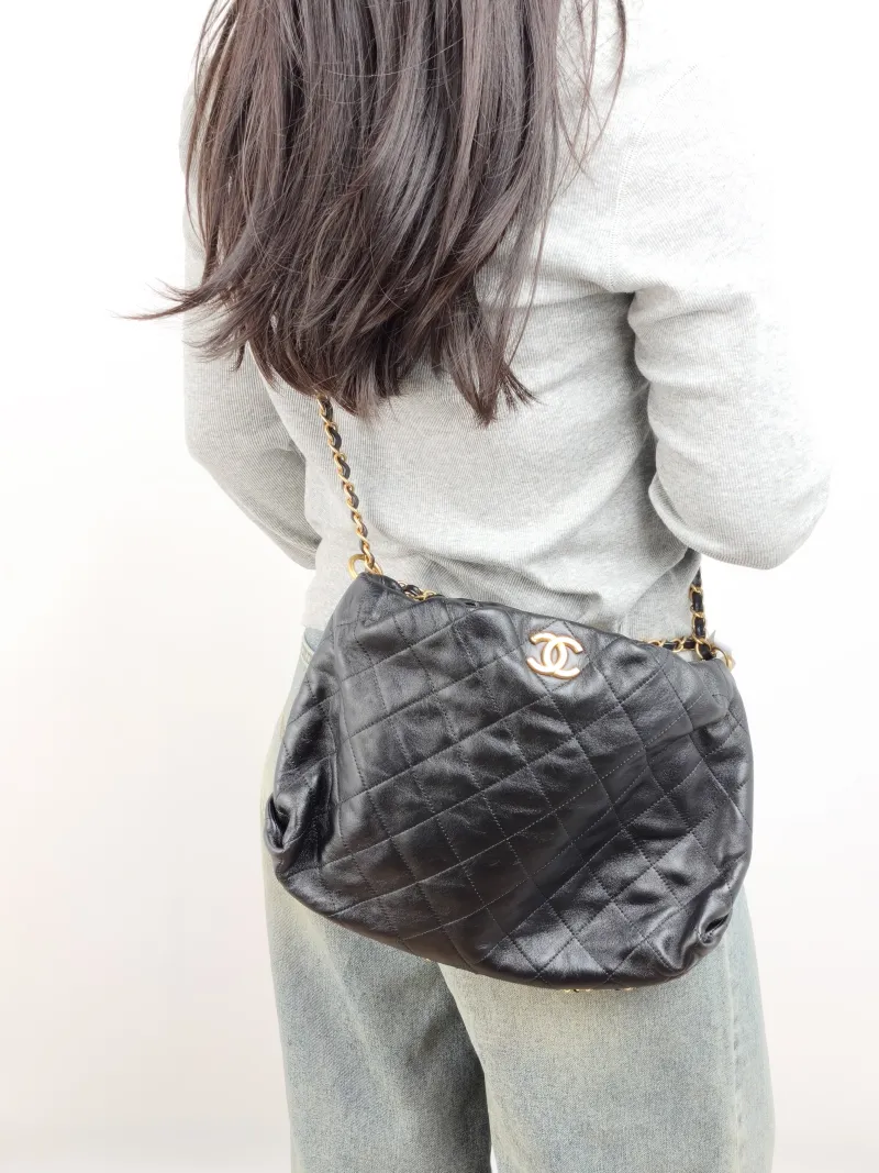Chanel Shoulder Bag hobo Black Lambskin One Size 32 × 10 × 26 cm 29 — on-model view 1 of 2