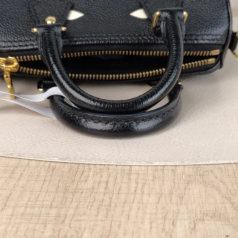 Louis Vuitton Crossbody Bag Speedy Nano Black · White Empreinte Embossed Calfskin Monogramnano16 × 7.5 × 10 cm — detail view 13 of 13