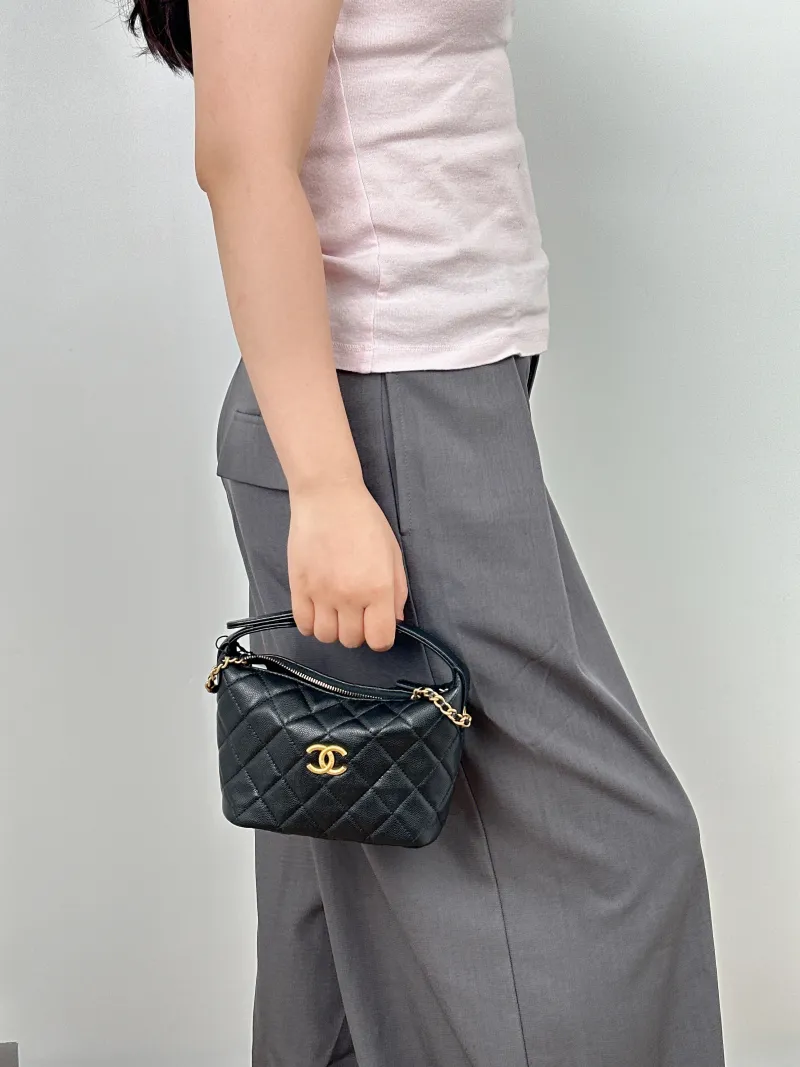 Chanel Crossbody Bag Gold-Tone Hardware Crossbody Bag Black Calfskin One Size21.5 × 7.5 × 19 cm — on-model view 2 of 2