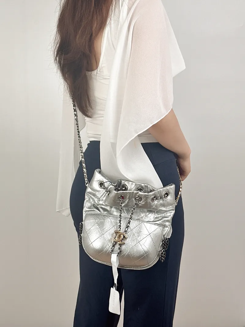 Chanel Crossbody Bag Gabrielle Collection Bucket Bag Silver Calfskin 20 × 6.5 × 22 cm — on-model view 1 of 2