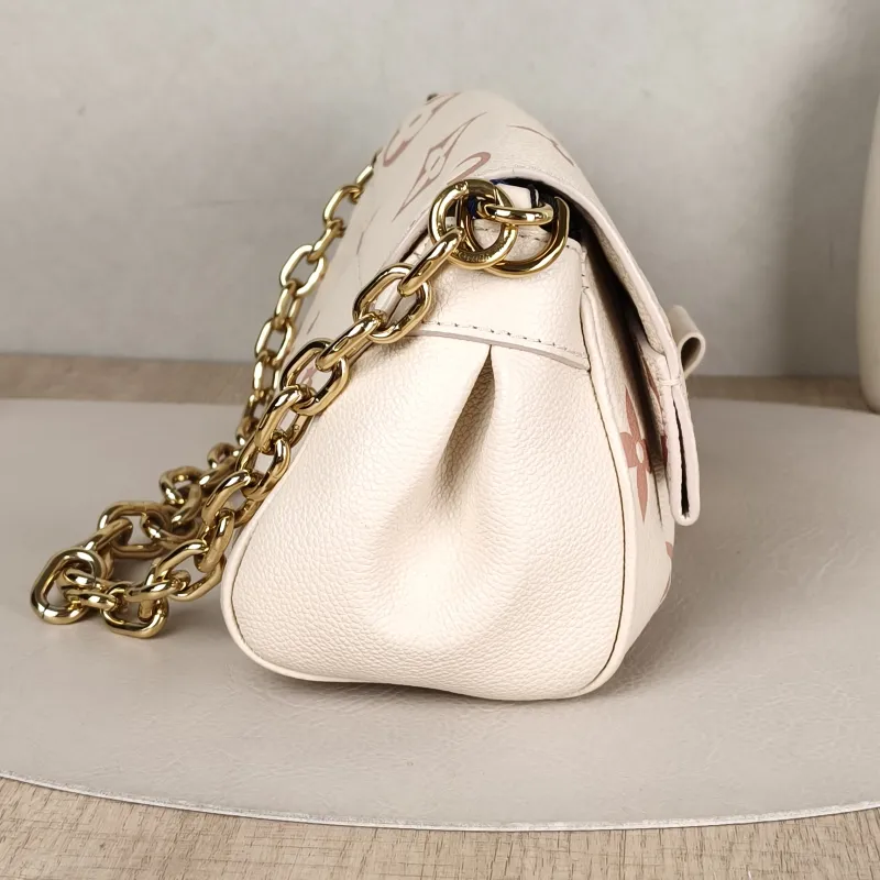 Louis Vuitton Crossbody Bag Favorite White · Pink Empreinte Embossed Calfskin Monogram Medium24 × 9 × 14 cm — detail view 13 of 14