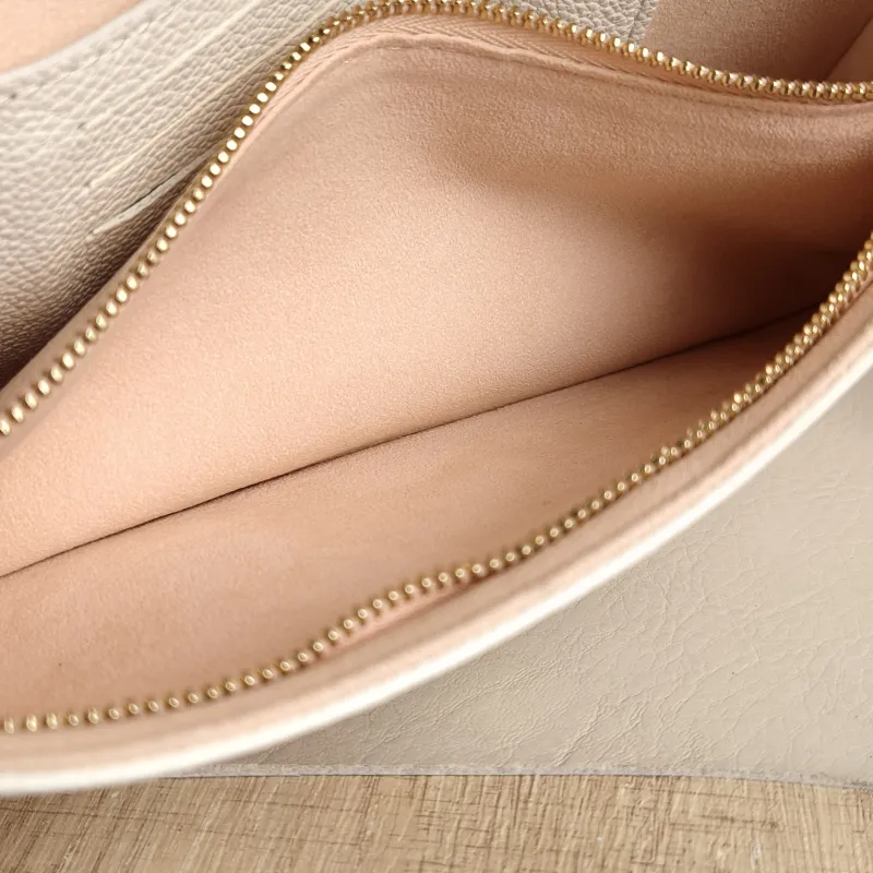 Louis Vuitton Crossbody Bag IVY White · Pink Monogram Empreinte Embossed Calfskin Small 23.5 × 4.3 × 12 cm — detail view 3 of 13