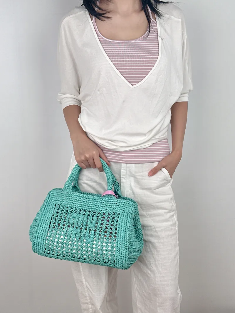 Miumiu Shoulder Bag Woven Woven One Size 29 × 5 × 20 cm — on-model view 1 of 3