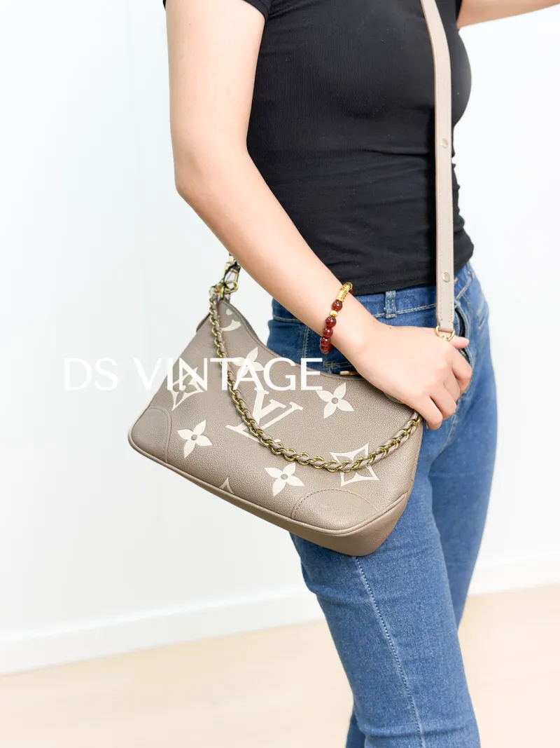 Louis Vuitton Crossbody Bag Boulogne Monogram Empreinte Embossed Calfskin Small 26 × 9.5 × 16 cm — on-model view 3 of 3