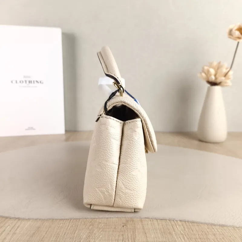 Louis Vuitton Crossbody Bag MADELEINE White Empreinte Embossed Calfskin nano 21 × 6 × 12.5 cm — detail view 10 of 11