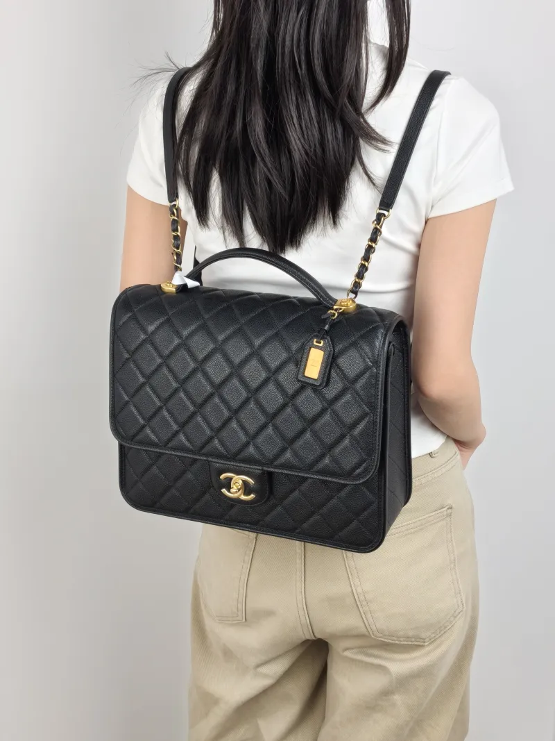 Chanel Backpack Backpack Black with Gold-Tone Hardware Grained Calfskin One Size 31 × 10 × 21 cm — on-model view 1 of 2