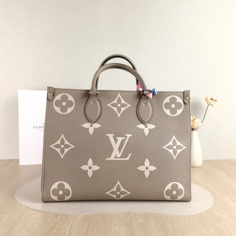 Louis Vuitton Shoulder Bag Onthego Medium · White Monogram Empreinte Embossed Calfskin Medium 35 × 14 × 27 cm — cover view 3 of 5