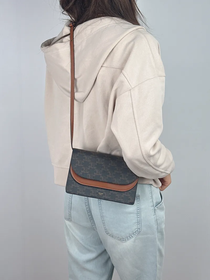CELINE Crossbody Bag TRIOMPHE Clutchwoc Monogram PVC One Size 20 × 6 × 12 cm — on-model view 2 of 2