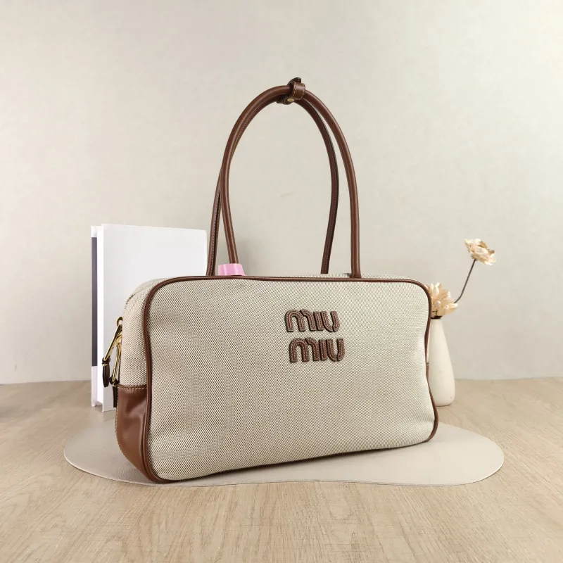 Miumiu Top Handle Bag Beau Brown Canvas · Calfskin Large34 × 10 × 20 cm — cover view 3 of 5