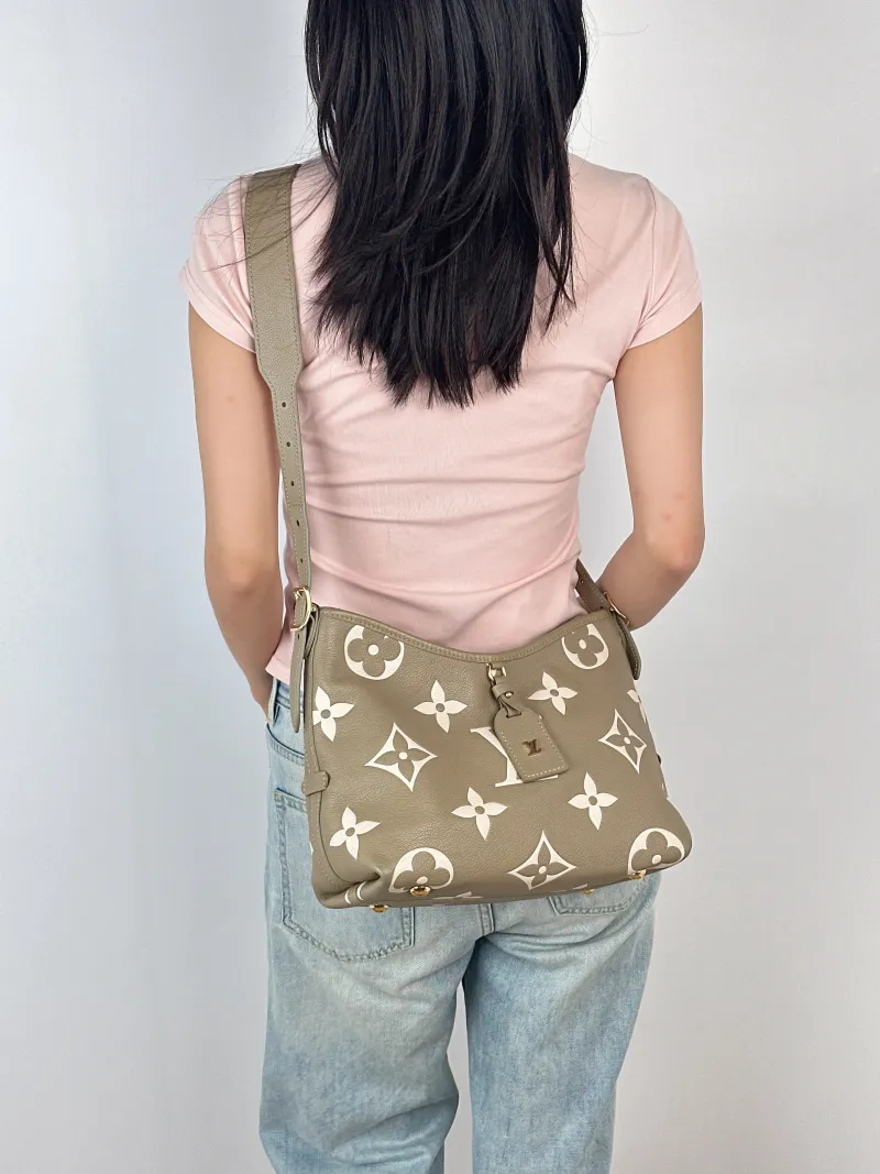 Louis Vuitton Crossbody Bag Carryall Calfskin Small29.5 × 12 × 24 cm — on-model view 1 of 2