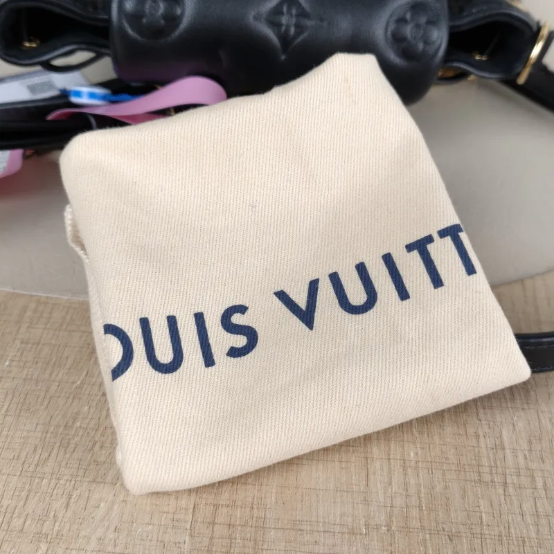Louis Vuitton Backpack Coussin Backpack Black with Gold-Tone Hardware Lambskin Mini 15 × 7.5 × 20 cm — detail view 13 of 14