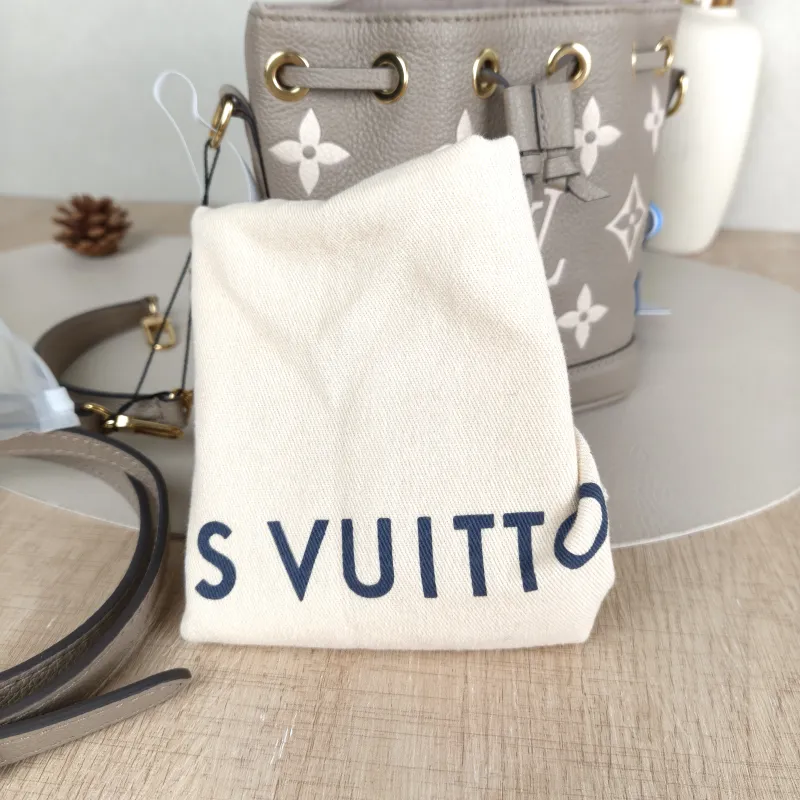 Louis Vuitton Crossbody Bag NANO NOÉ Bucket Bag Nano · White Monogram Empreinte Embossed Calfskin nano 13 × 10 × 16 cm — detail view 6 of 11