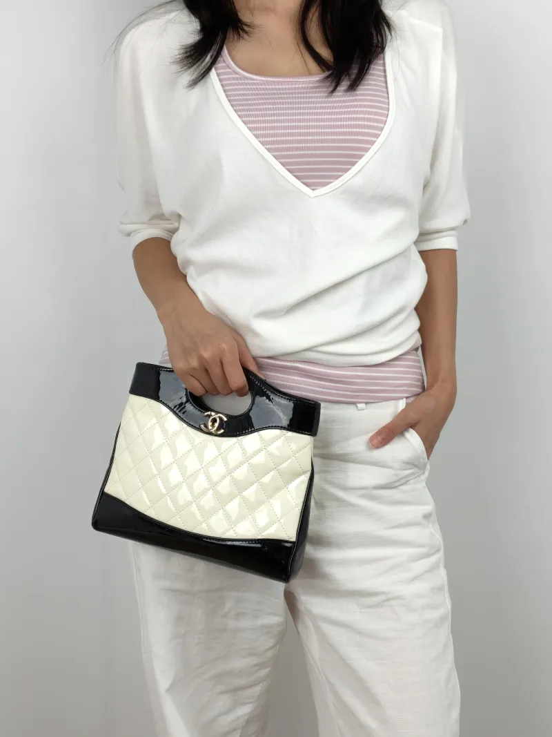 Chanel Crossbody Bag 31Bag Patent Leather Mini 23 × 5.5 × 22 cm — on-model view 1 of 3