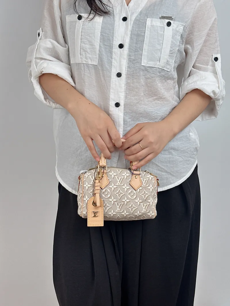 Louis Vuitton Crossbody Bag Speedy Nano Beige nano 16 × 7.5 × 10 cm — on-model view 2 of 2