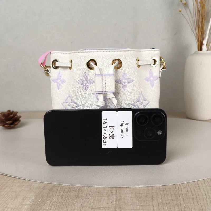 Louis Vuitton Crossbody Bag NANO NOÉ Bucket Bag Nano White · Monogram Empreinte Embossed Calfskin nano 13 × 10 × 16 cm — cover view 5 of 5