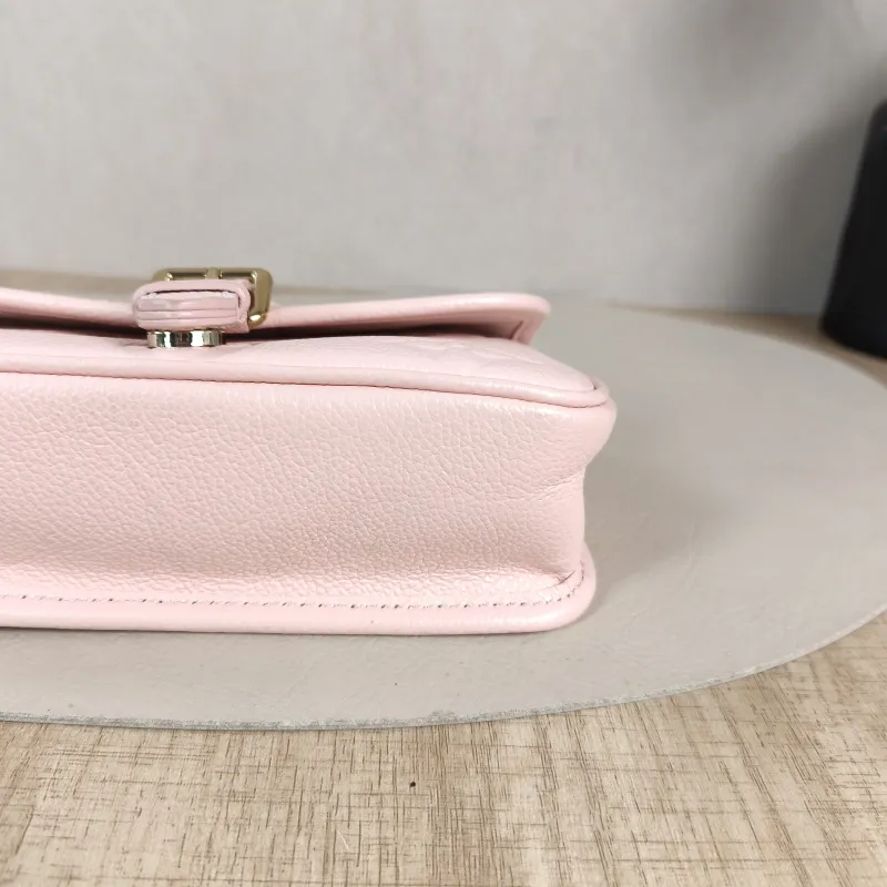 Louis Vuitton Crossbody Bag Diane Baguette Bag Monogram Empreinte Embossed Calfskin nano 19 × 6 × 10.5 cm — detail view 10 of 13