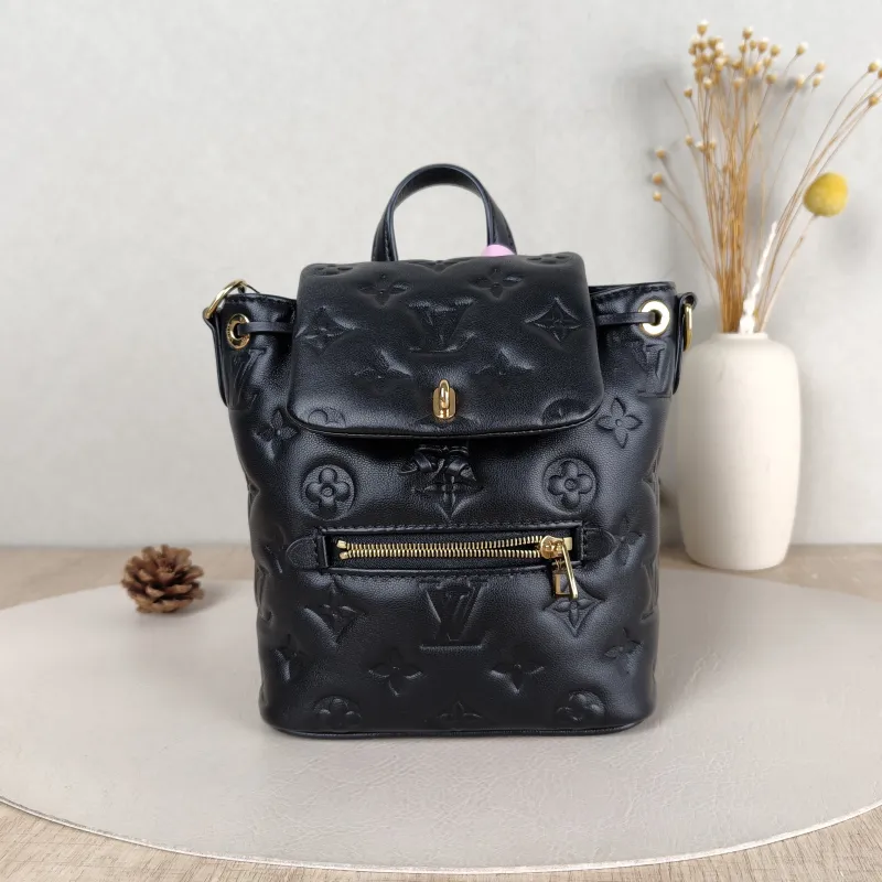 Louis Vuitton Backpack Coussin Backpack Black with Gold-Tone Hardware Lambskin Mini 15 × 7.5 × 20 cm