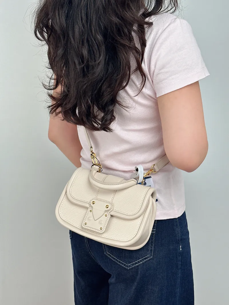 Louis Vuitton Crossbody Bag Hide and Seek Messenger Bag White Epi Embossed Calfskin 21 × 8 × 15 cm — on-model view 1 of 2