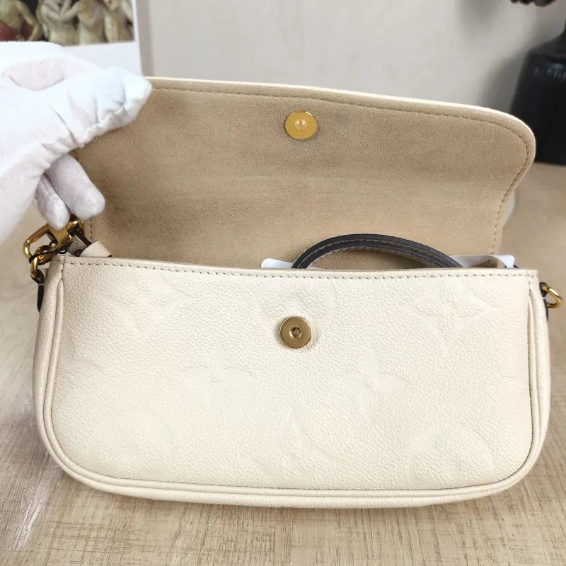 Louis Vuitton Crossbody Bag IVY White Monogram Empreinte Embossed Calfskin Small 23.5 × 4.3 × 12 cm — detail view 11 of 11
