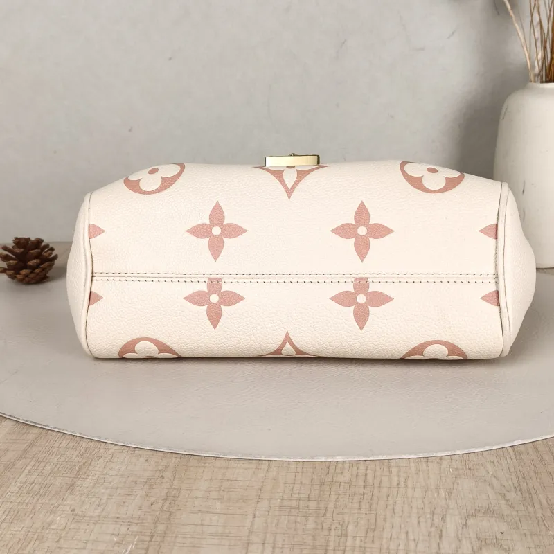 Louis Vuitton Crossbody Bag Favorite White · Pink Empreinte Embossed Calfskin Monogram Medium24 × 9 × 14 cm — cover view 6 of 6