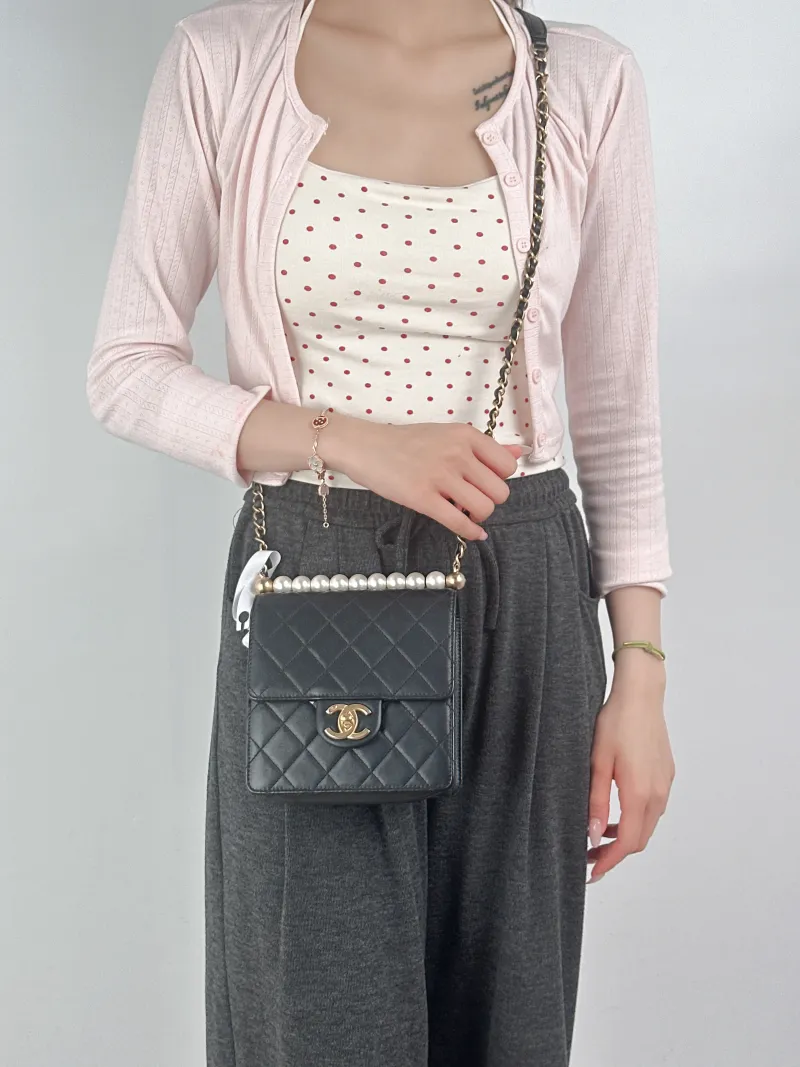 Chanel Crossbody Bag Crossbody Bag Black Calfskin15.5 × 5 × 15 cm — on-model view 3 of 3