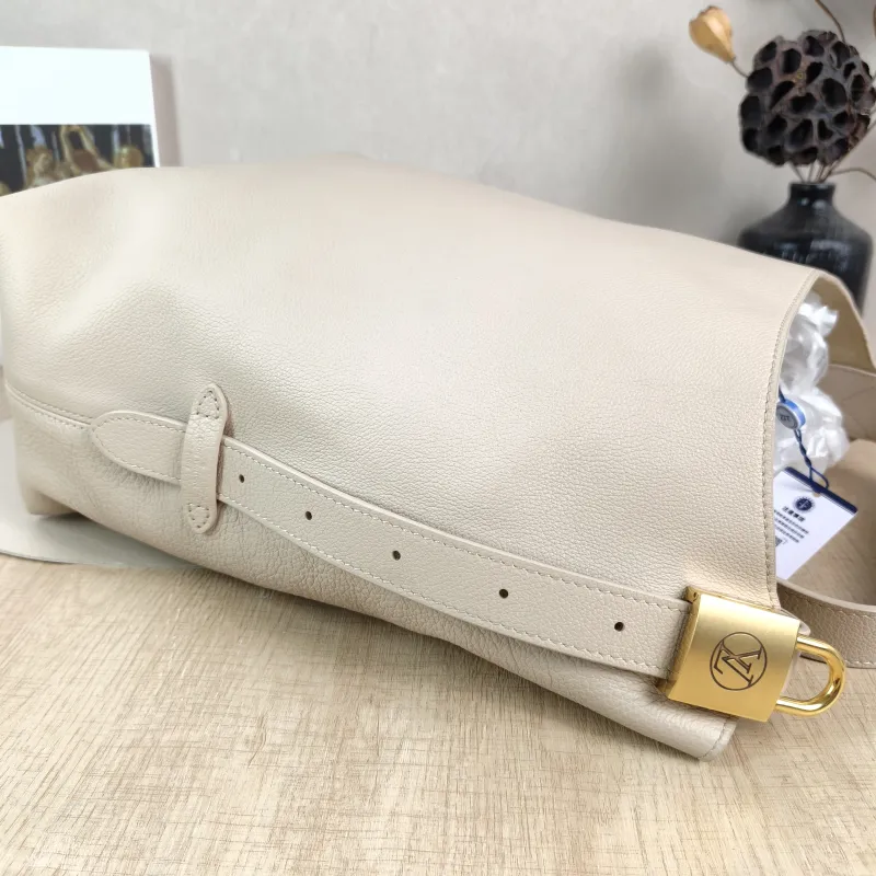 Louis Vuitton Shoulder Bag Low Key Hobo Shoulder Bag White Calfskin Medium 31 × 18 × 35 cm — detail view 3 of 12