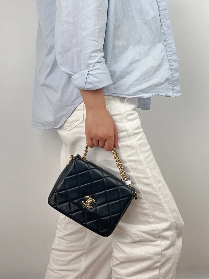 Chanel Crossbody Bag21b Black Lambskinmini19 × 6 × 16 cm — on-model view 1 of 2