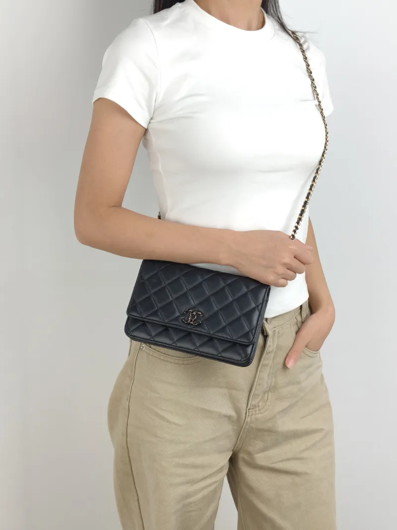 Chanel Crossbody Bag CF WOC Black Lambskin Mini 19.2 × 3.5 × 12.3 cm — on-model view 1 of 2
