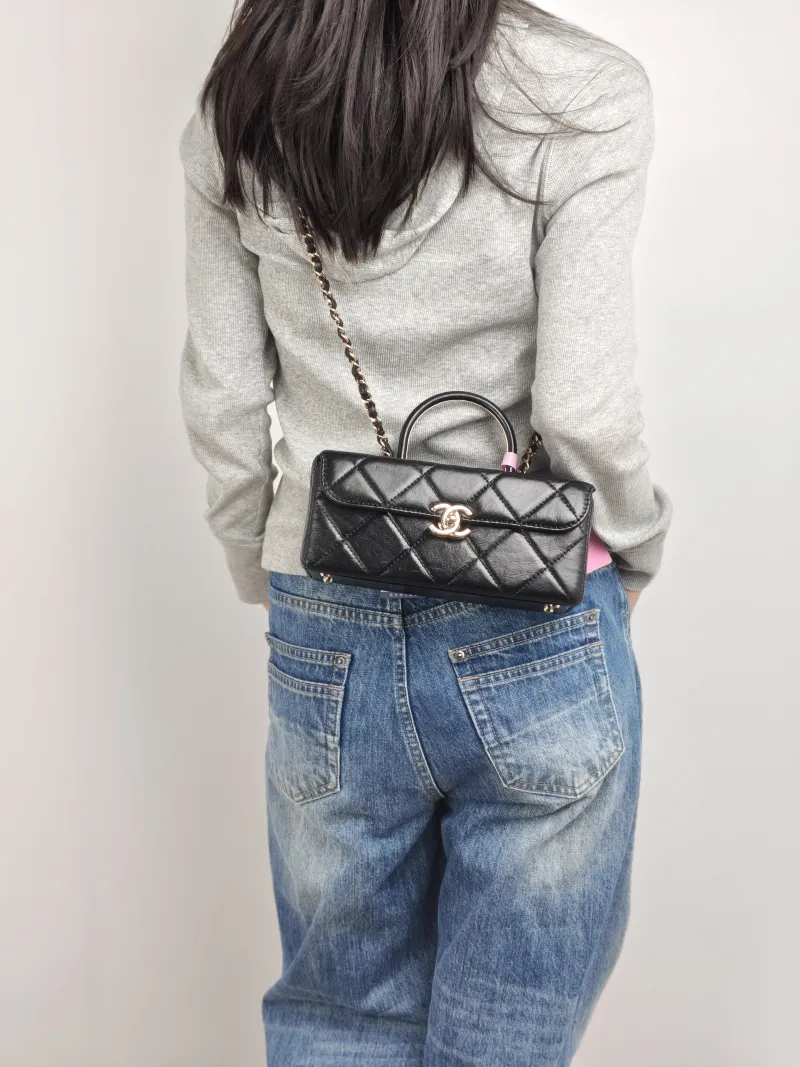Chanel Crossbody Bag Box Bag Top Handle Crossbody Bag Black Calfskin 22 × 9 × 9.5 cm — on-model view 1 of 3