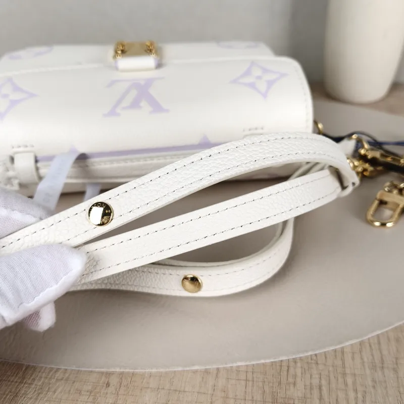 Louis Vuitton Crossbody Bag Pochette Métis East West White · Monogram Empreinte Embossed Calfskin Small 21.5 × 6 × 13.5 cm — detail view 13 of 15