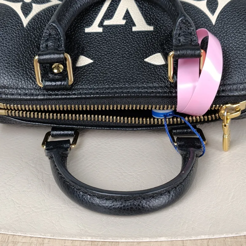Louis Vuitton Crossbody Bag Speedy Nano Black · White Monogram Empreinte Embossed Calfskin nano 16 × 7.5 × 10 cm — detail view 8 of 10