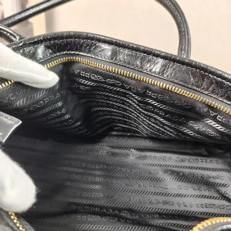 PRADA Shoulder Bag Bonnie Soft Lux Black Waxed Leather Medium 32 × 12 × 15.5 cm — detail view 1 of 13