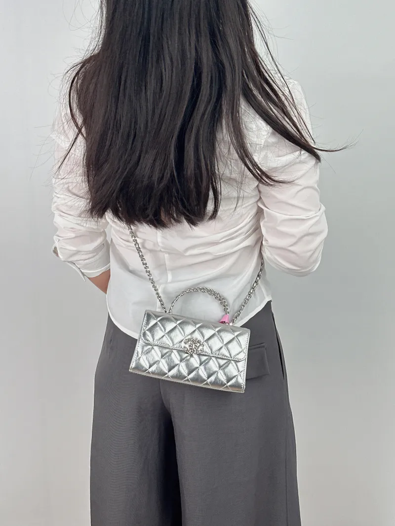 Chanel Crossbody Bag kelly Silver Waxed Leather One Size 18 × 4.5 × 10 cm — on-model view 1 of 2