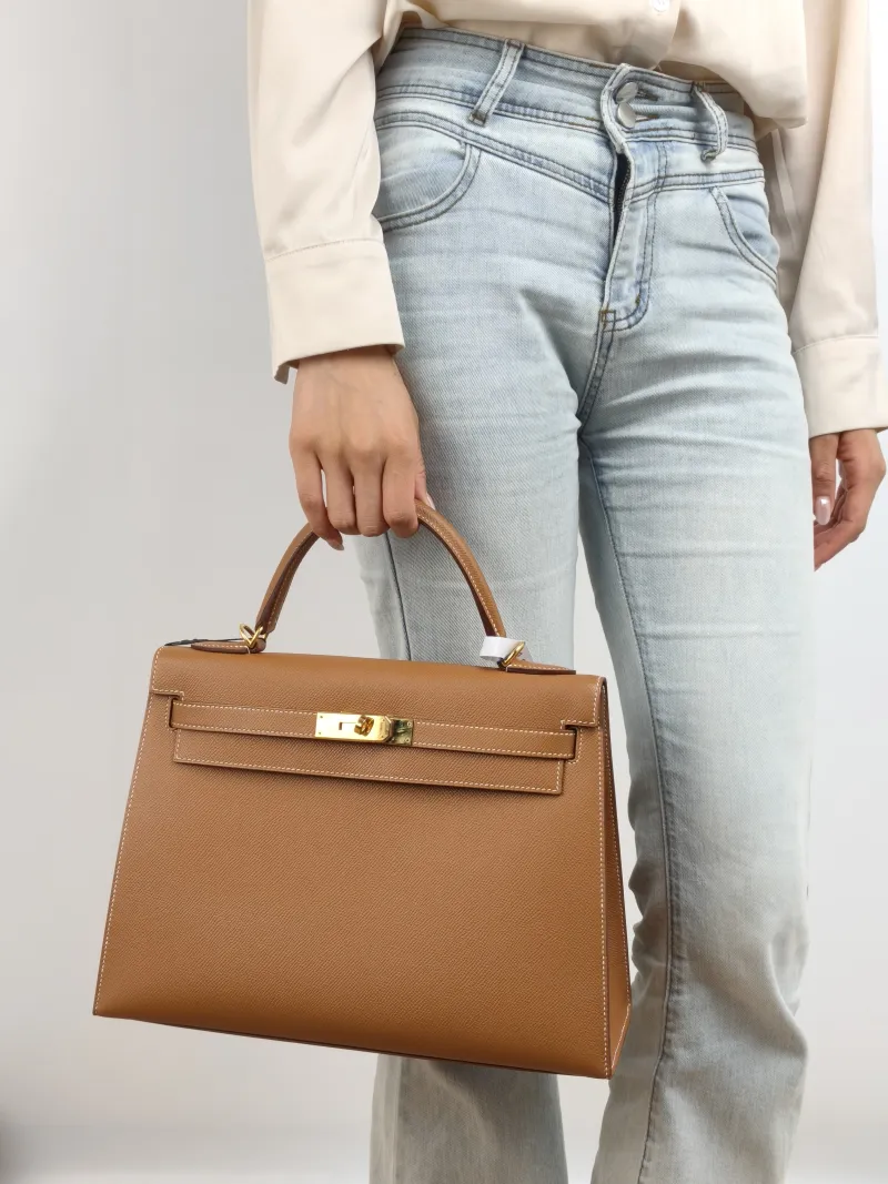 Hermès Shoulder Bag Kelly 32 Gold-Tone Hardware Epsom Calfskin Large 32 × 11 × 23 cm Y — on-model view 3 of 3
