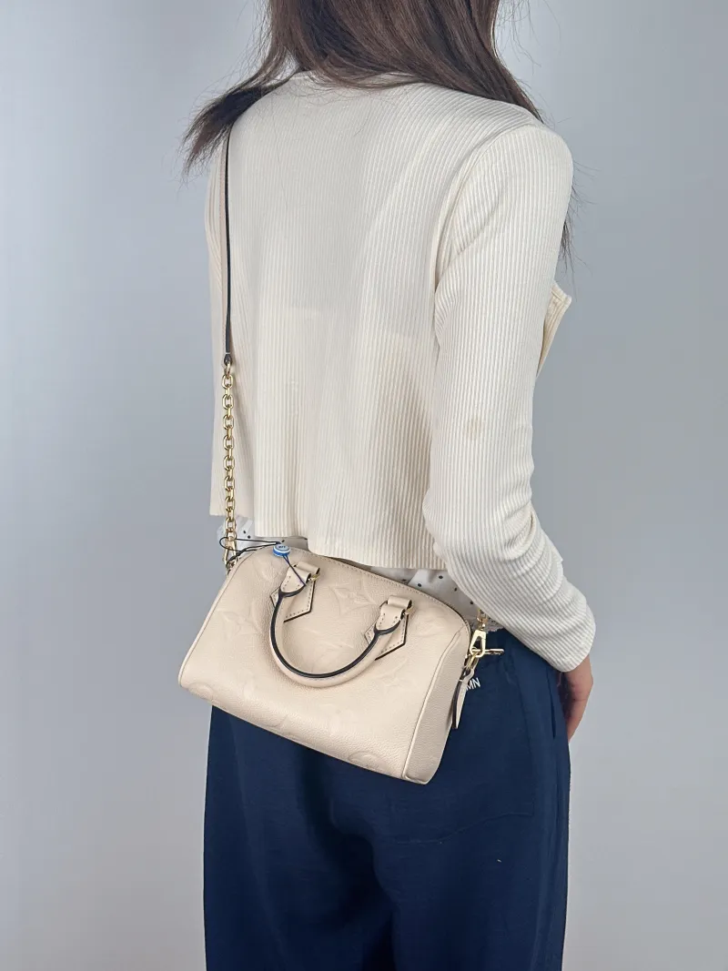 Louis Vuitton Crossbody Bag Speedy20 White Empreinte Embossed Calfskin Small 20.5 × 12 × 13.5 cm — on-model view 3 of 3